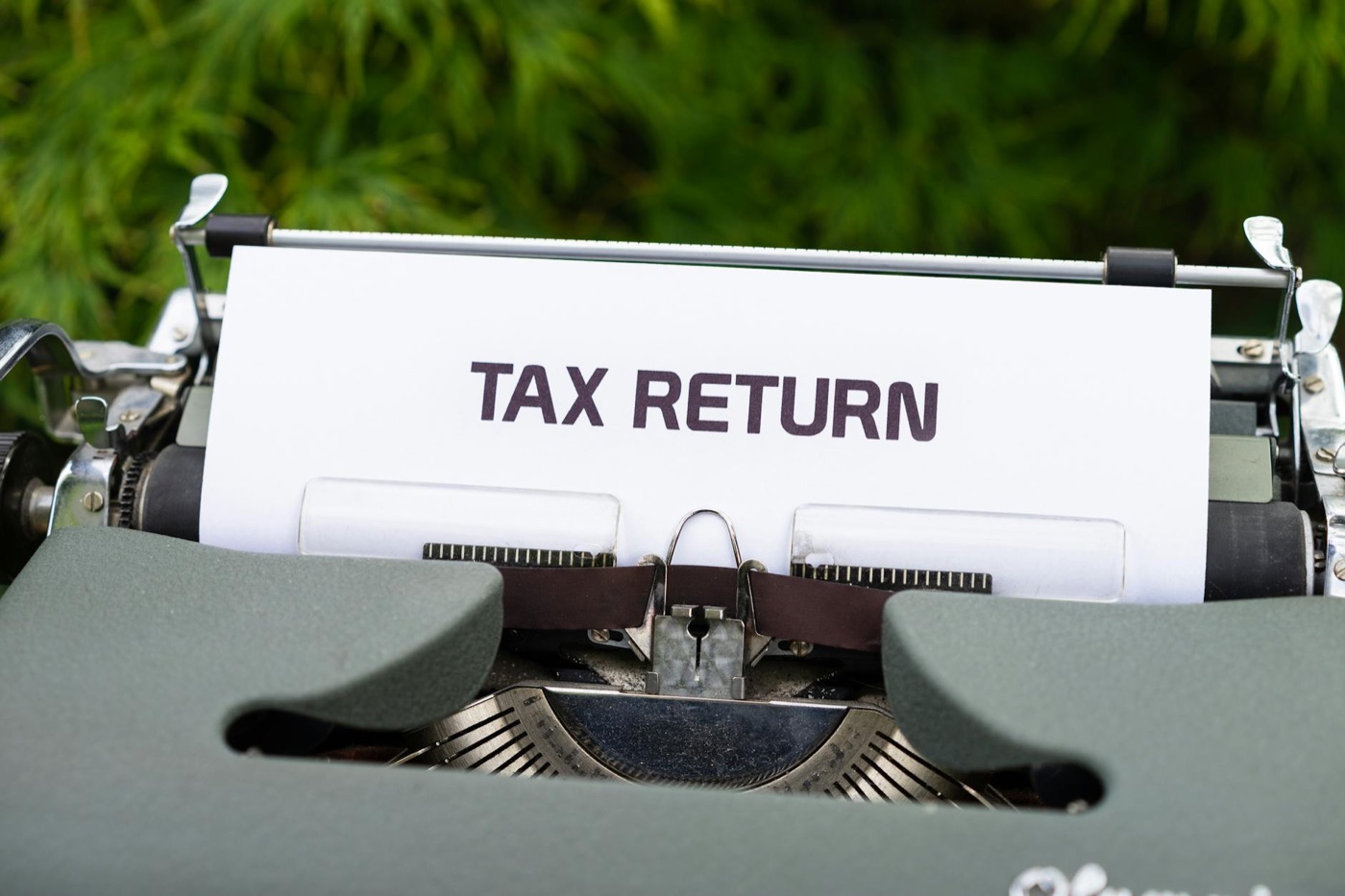 Personal and business tax returns — preparation and filing support from AIM GB Ltd